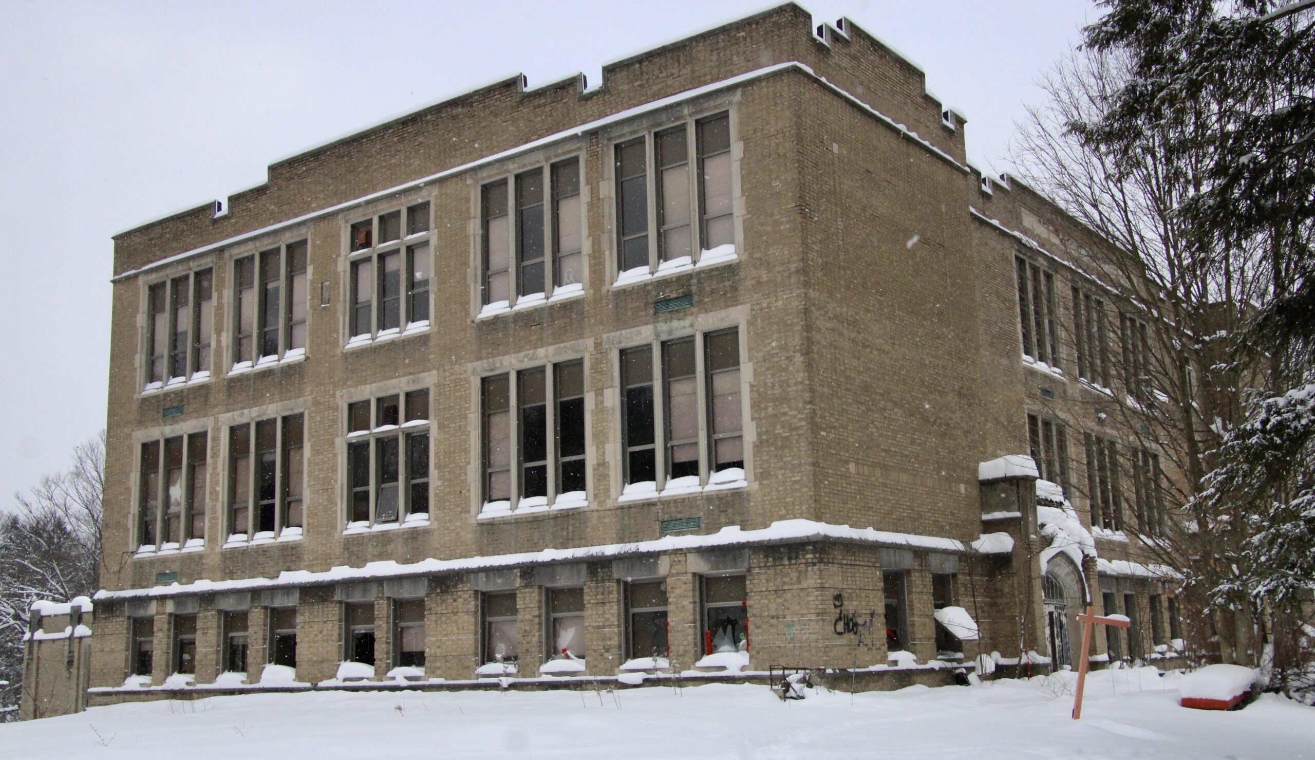 (Rick Miller/Olean Star) The three-story former Cattaraugus Elementary School, 51 Washington St., Cattaraugus, was the target of an arsonist Tuesday. Firefighters from Cattaraugus and six other communities responded to the mutual aid fire.