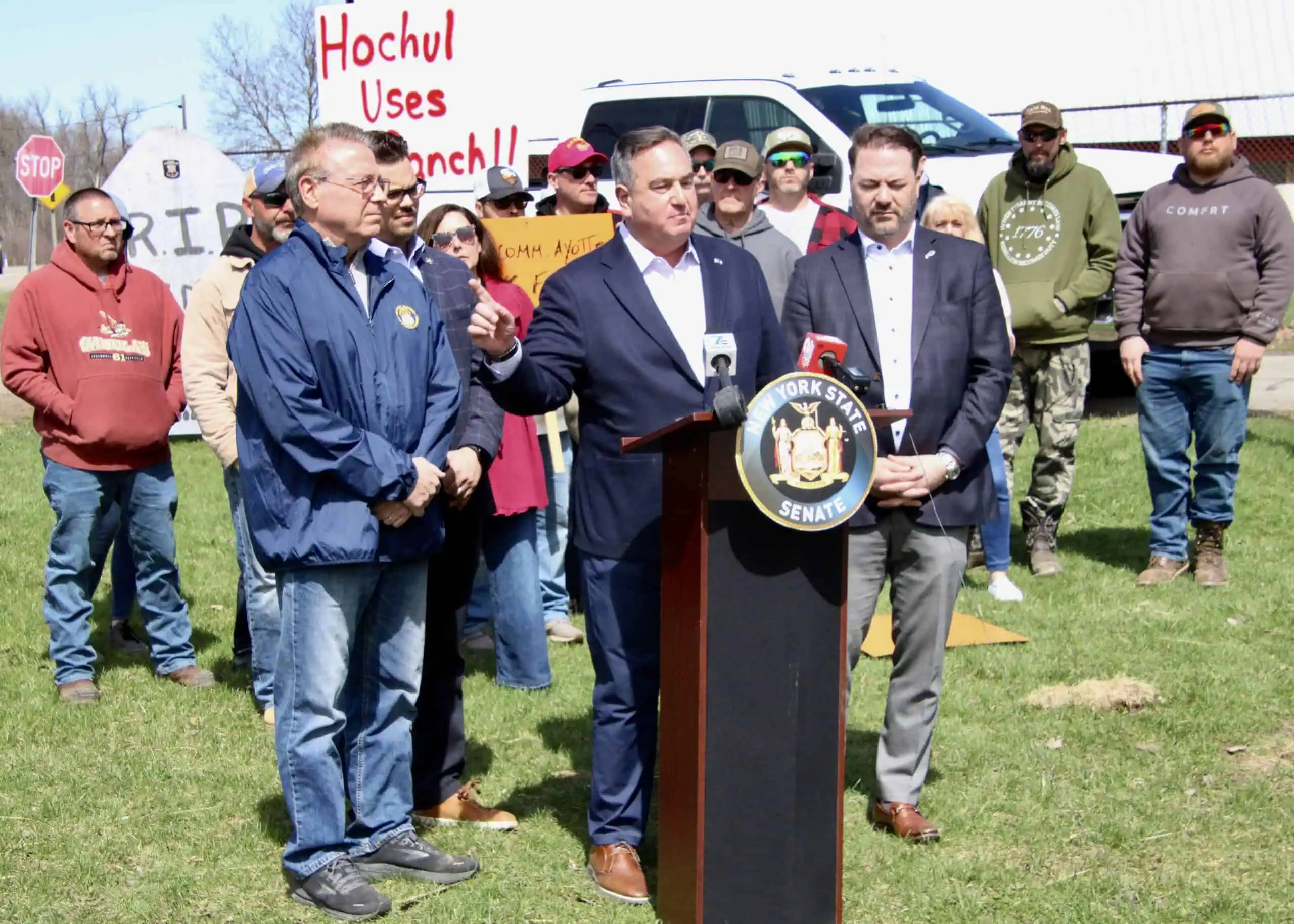 (Rick Miller/Olean Star) State Sen. George Borrello (at podium) speaks at a press conference by Republican state lawmakers from Western New York over plans for early release of some non-violent inmates due to correctional facilities staffing shortages. On the left are Assemblymen David DiPietro and Paul Bologna. Senate Minority Leader Robert Ort is on the right.