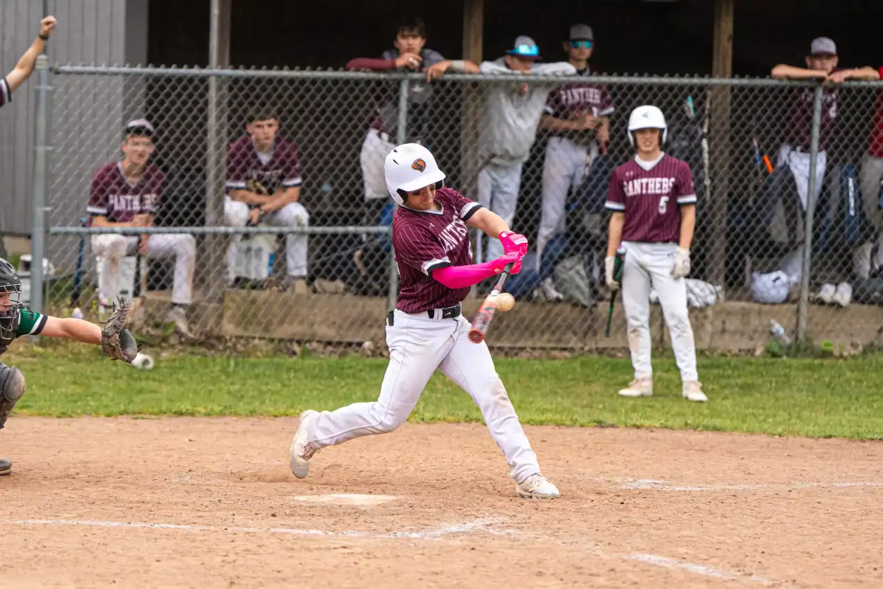 Portville's Cole Keesler comes up with a clutch hit, driving in the game-winning run as the Panthers' take down CSP in the Section VI Class C quarterfinals. | Photo by Hunter O. Lyle