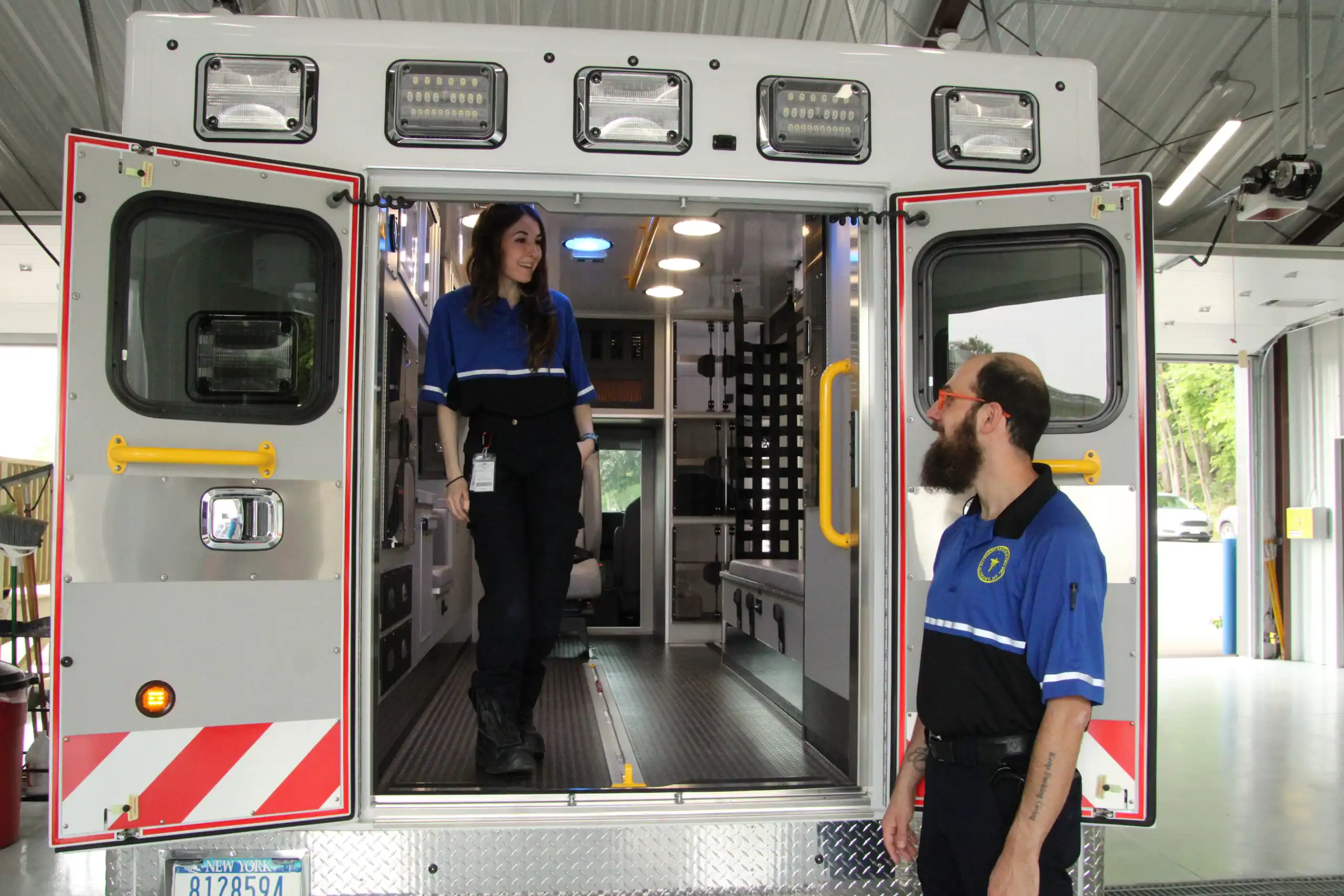 (Rick Miller/Olean Star) Danielle Aiello, (left) an assistant and Michael Gargano, an emergency medical technician, gave people tours of one of the ambulances at the June 7 open house at the new Allegany Rescue and EMS headquarters at 117 E. Main St. A public open house will be held from 2-7 p.m. Saturday, June 14.