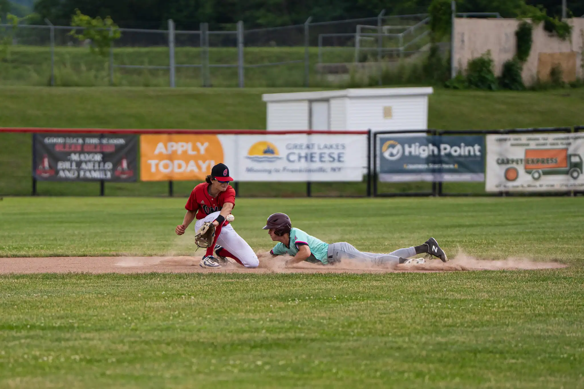 Salamanca's Frank Kula steals second, avoiding Matthew Boffalo's tag during the first of two games between the Lizards and Oilers on Wednesday. | Photo by Hunter O. Lyle