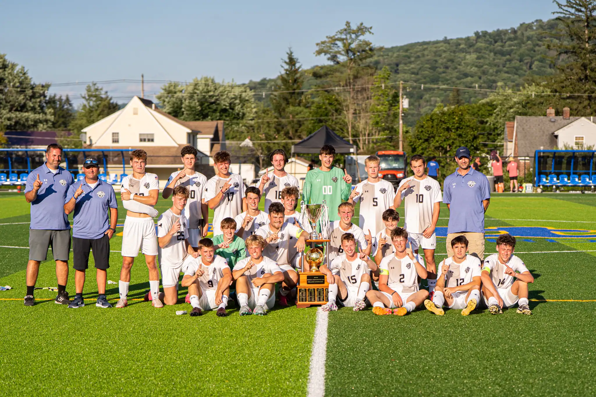 The New York Gold team poses with their newly-acquired hardware after beating Pennsylvania 2-1 in the Corporate Cup Soccer Showcase. | Photo by Hunter O. Lyle