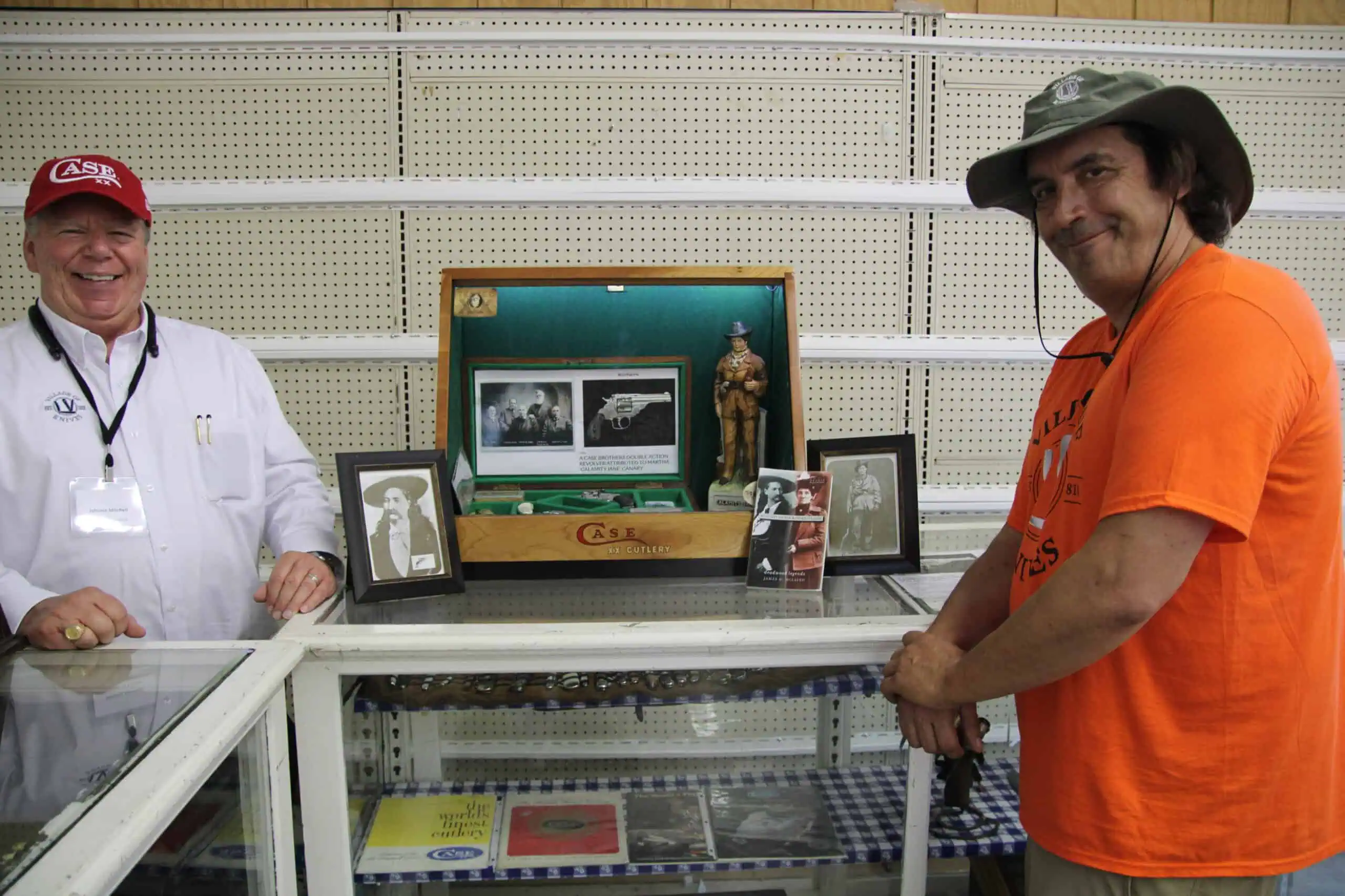 ((Rick Miller/Olean Star) Village of Knives II promoter Brad Lockwood holds a display case with mostly rusted knife blades recovered during a “dig” at two local cutlery sites in Little Valley last week.
