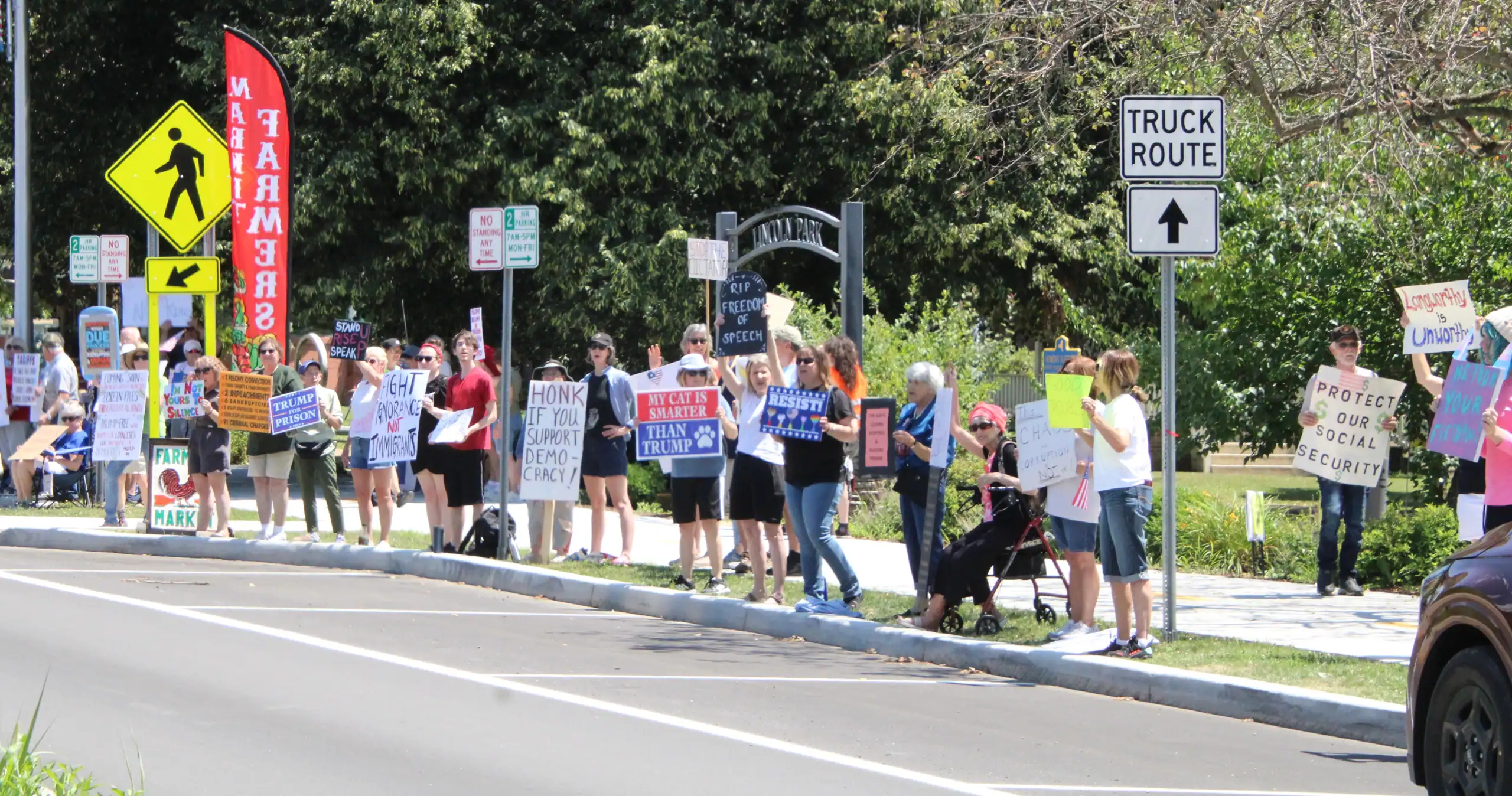 (Rick Miller/Olean Star) About 120 protesters attended a “Good Trouble” demonstration on East State Street on Saturday. They were protesting passage and signing of the “One Big Beautiful Bill Act” and cuts to Medicaid and food stamps.
