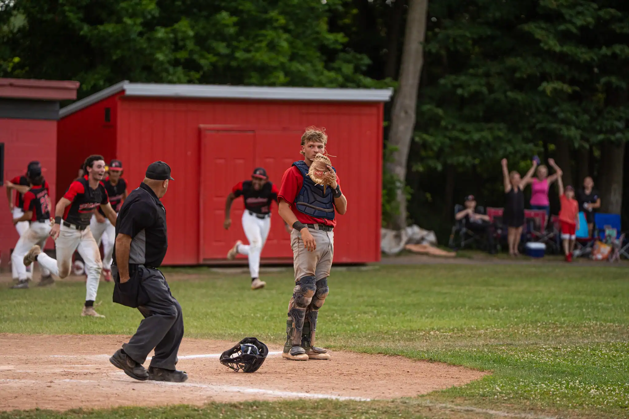 Brodie Collins stands at home as the Gliders celebrate their 7-6 extra-innings win over the Oilers in the first round of the playoffs. | Photo by Hunter O. Lyle