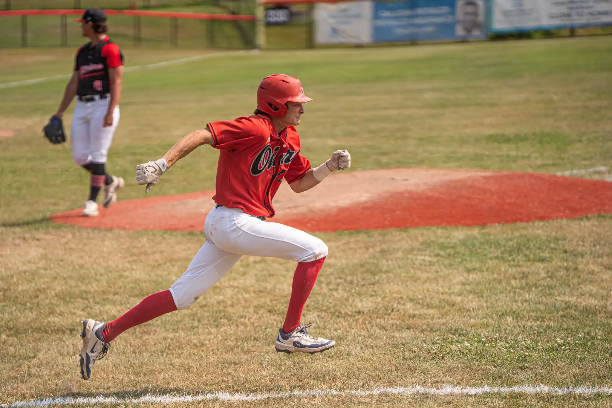 Matthew Boffalo sprints to first base during the Oiler's 11-3 loss to Dansville on Friday. | Photo by Hunter O. Lyle