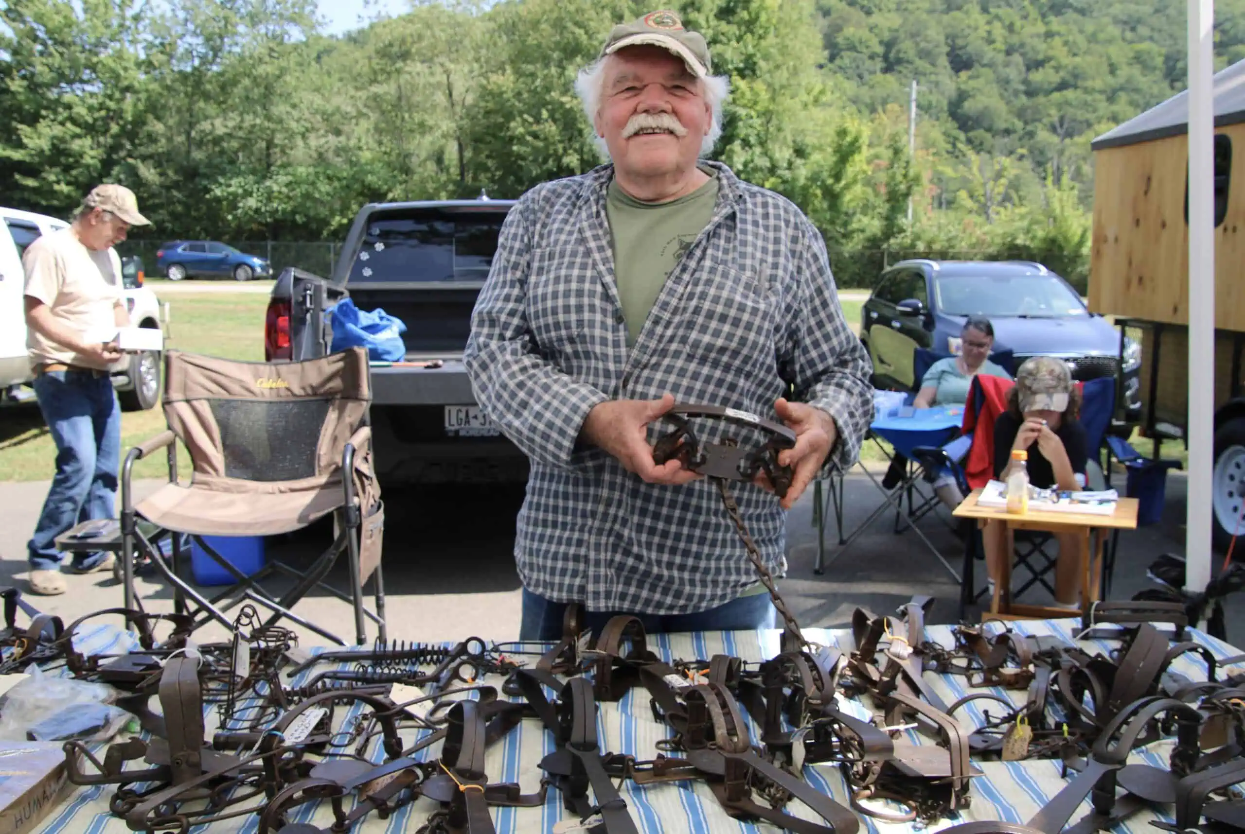 (Rick Miller/Olean Star) Steve Langert of Pleasant Valley holds a Triumph Master Grip trap, a collector’s item he values at $550 at the 45th annual Cattaraugus County Trappers Association Sportsmen’s Rendezvous last weekend at the county fairgrounds in Little Valley.