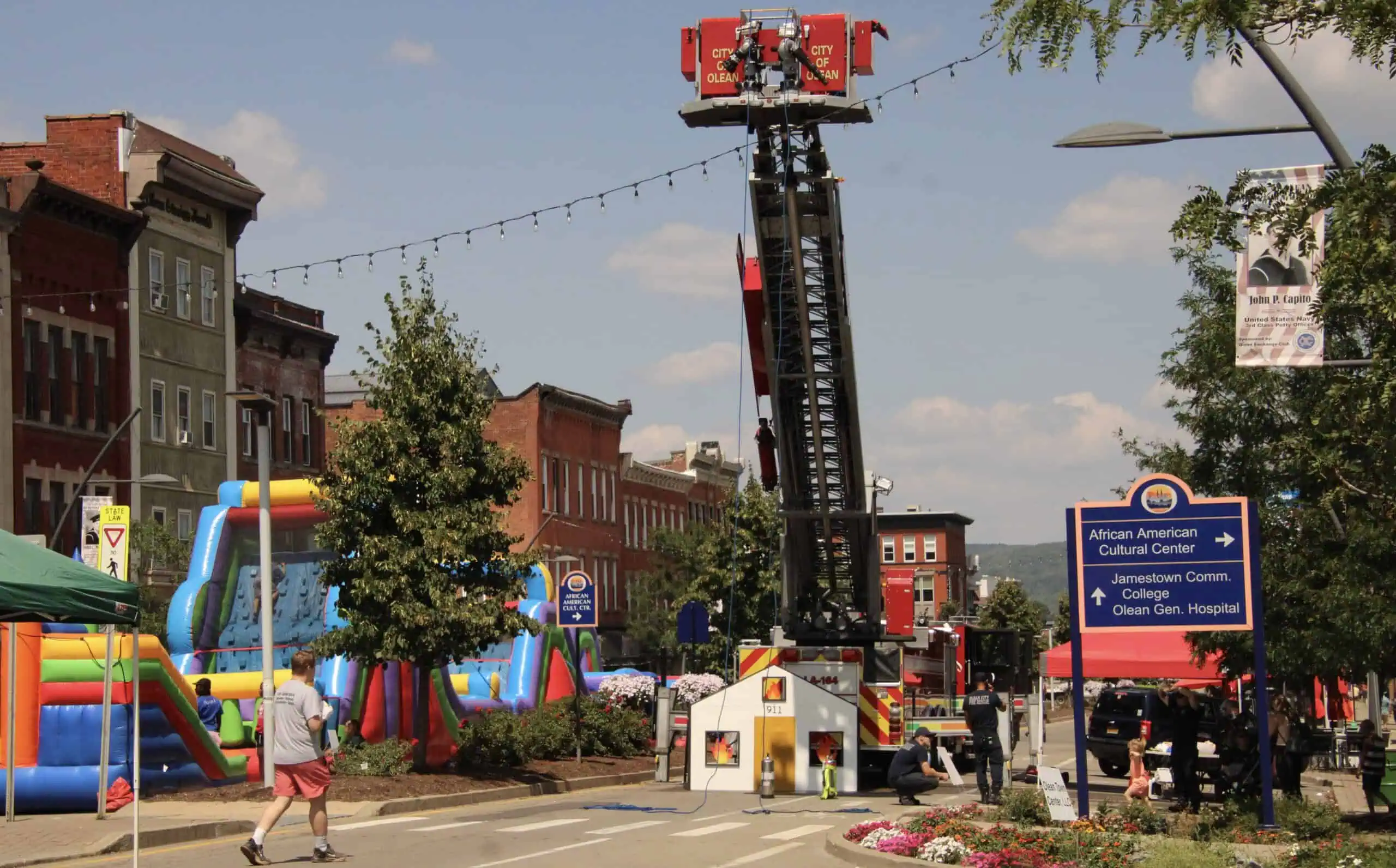 (Rick MIller/Olean Star) Olean firefighters helped train kids for putting out a fire at a display they had at StrOlean on North Union Street on Saturday.