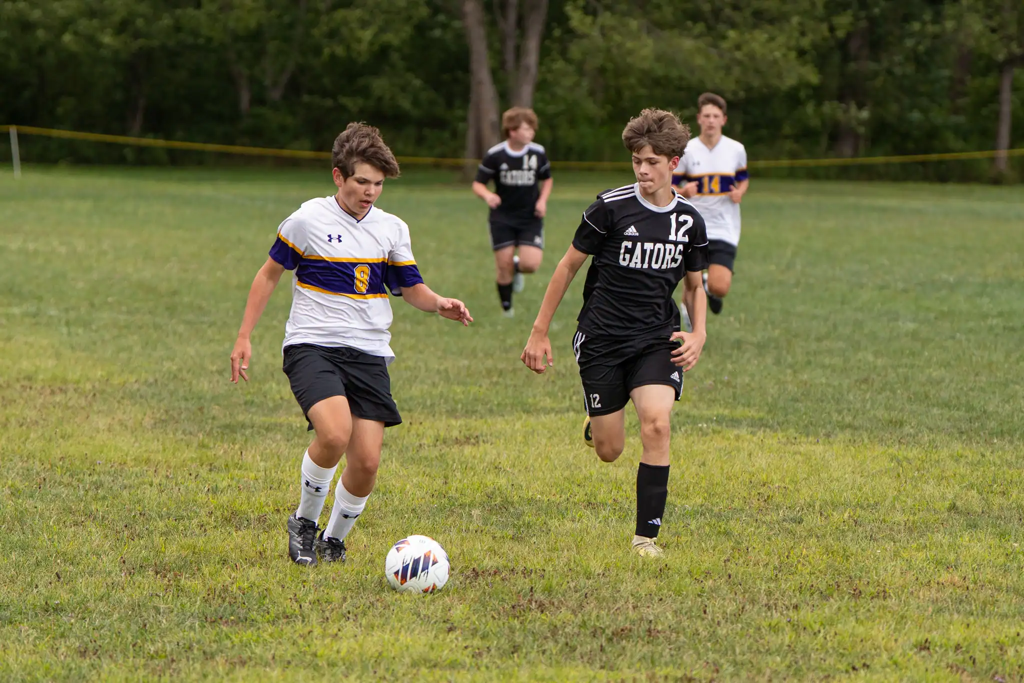 Port Allegany's Brody Kazimer rushes to contest the Wolves' possession during their 6-2 loss to North Clarion on Monday. | Photo by Hunter O. Lyle
