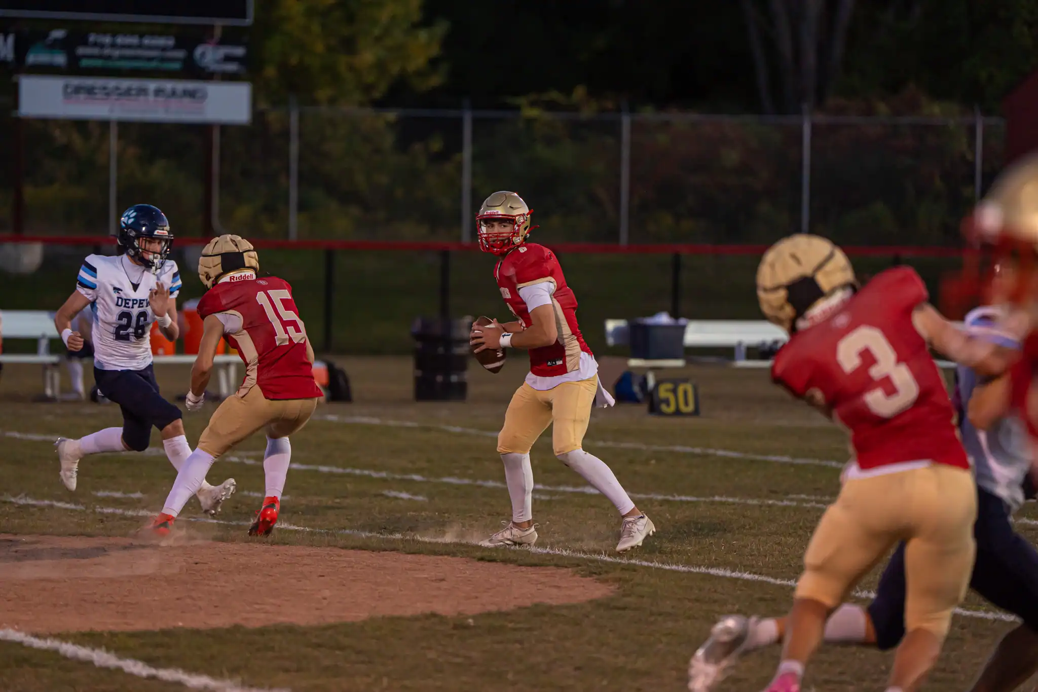 Olean quarterback Joe Mest scans the field during the Huskies' 28-26 loss to Depew. | Photo by Hunter O. Lyle
