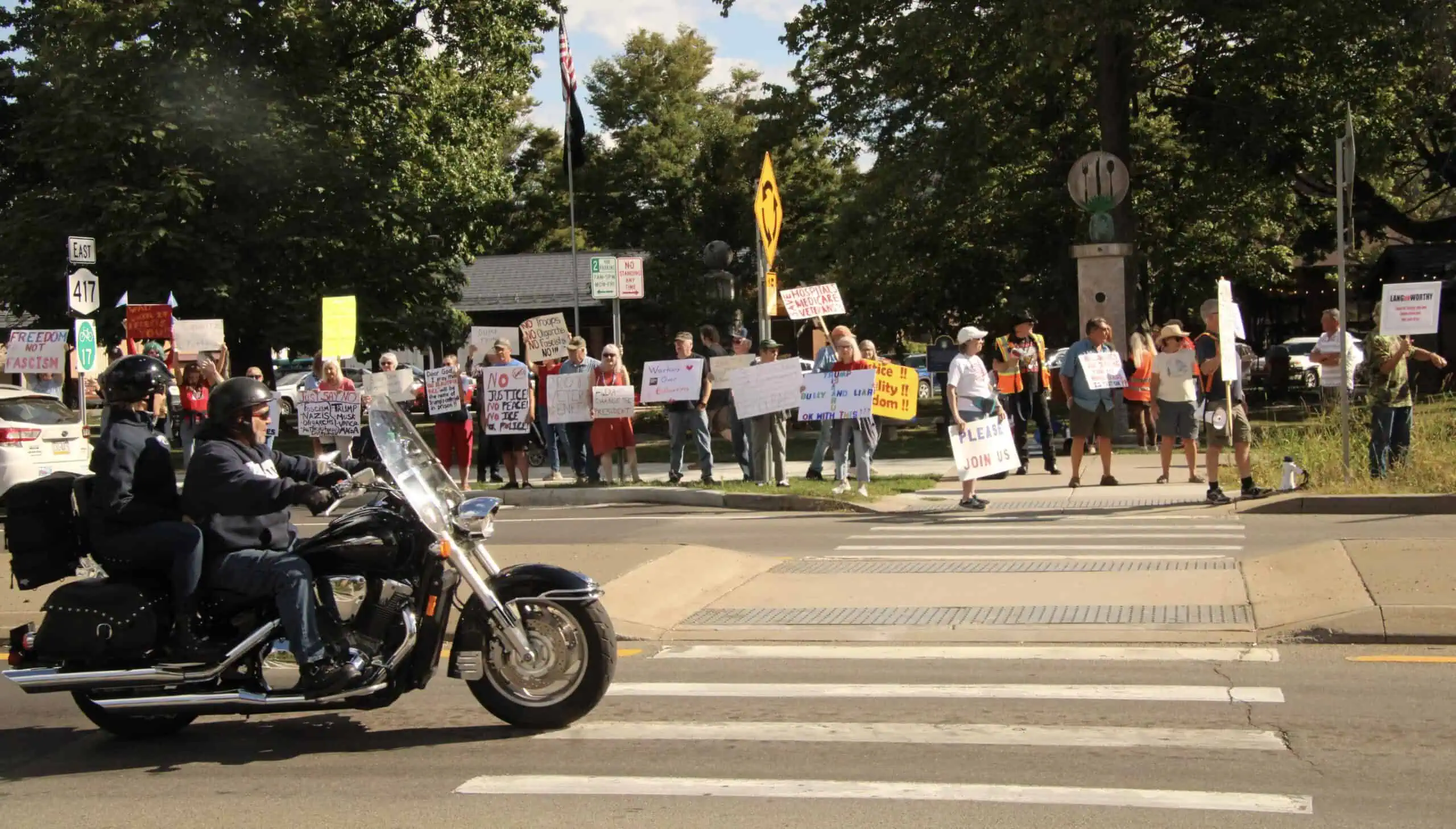 (Rick Miller/OIean Star) More than 100 protested outside Lincoln Park Monday in the local Workers Over Billionaires demonstration.