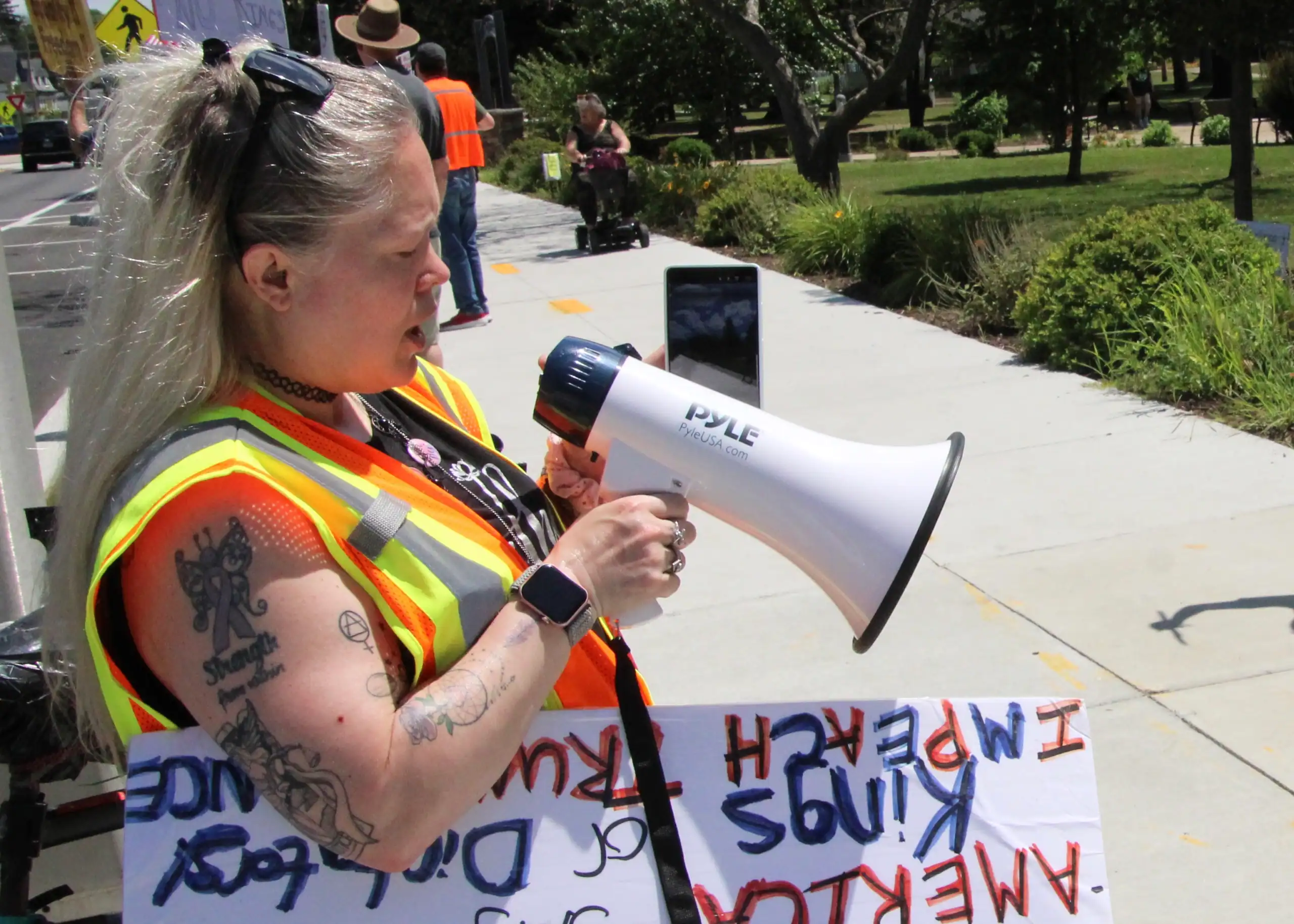 (Rick Miller/Olean Star) Jessica Davis of Olean has helped organize several Olean protests over Presiodent Trump's policies. She helped organize this Saturday's National Day of Proptest at L:incoln Park.