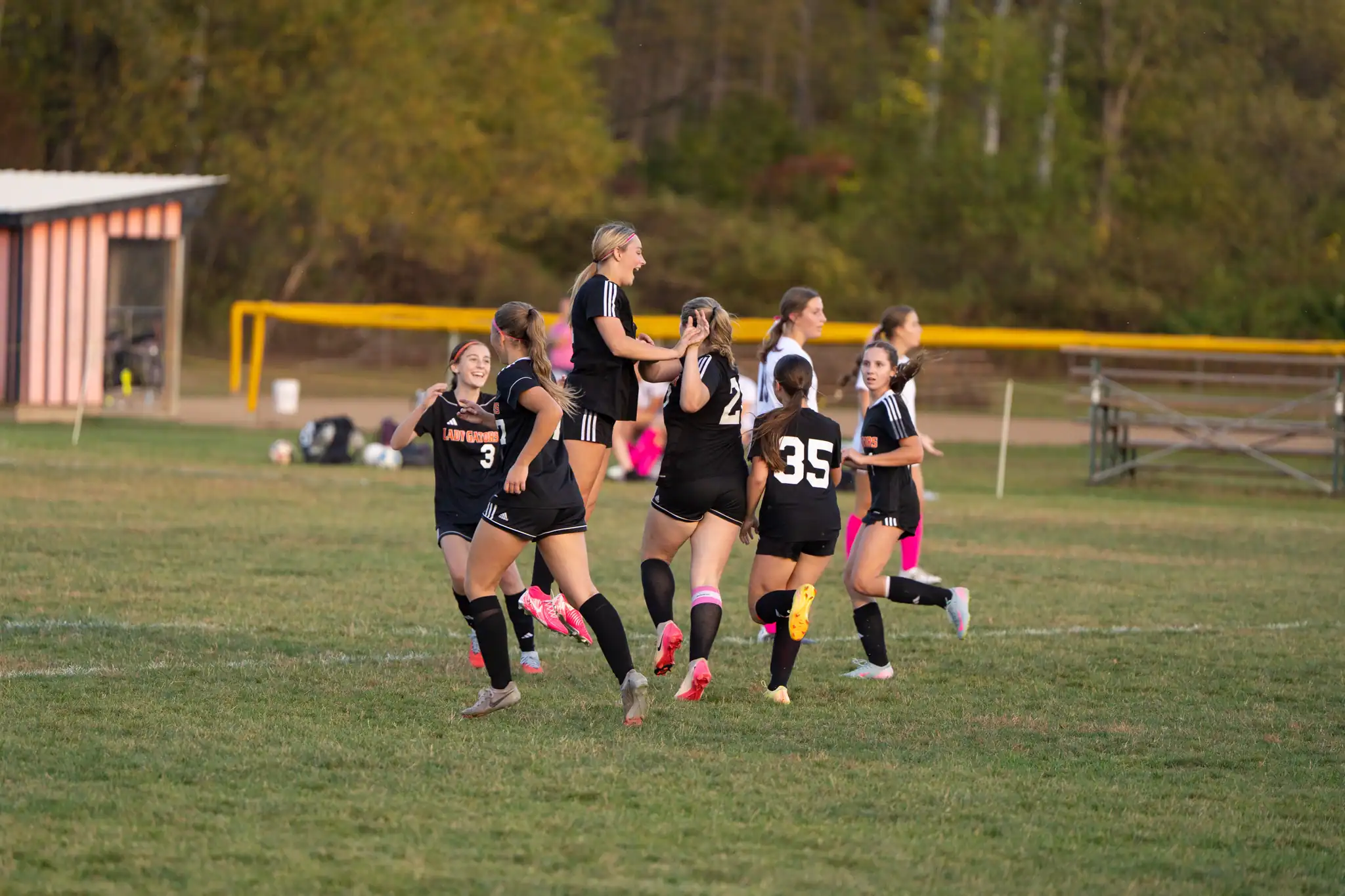 The Port Allegany girl's soccer team celebrates a late goal from Ketha Line during their 3-1 win over Ridgway. The score would be Line's first of the season. | Photo by Hunter O. Lyle