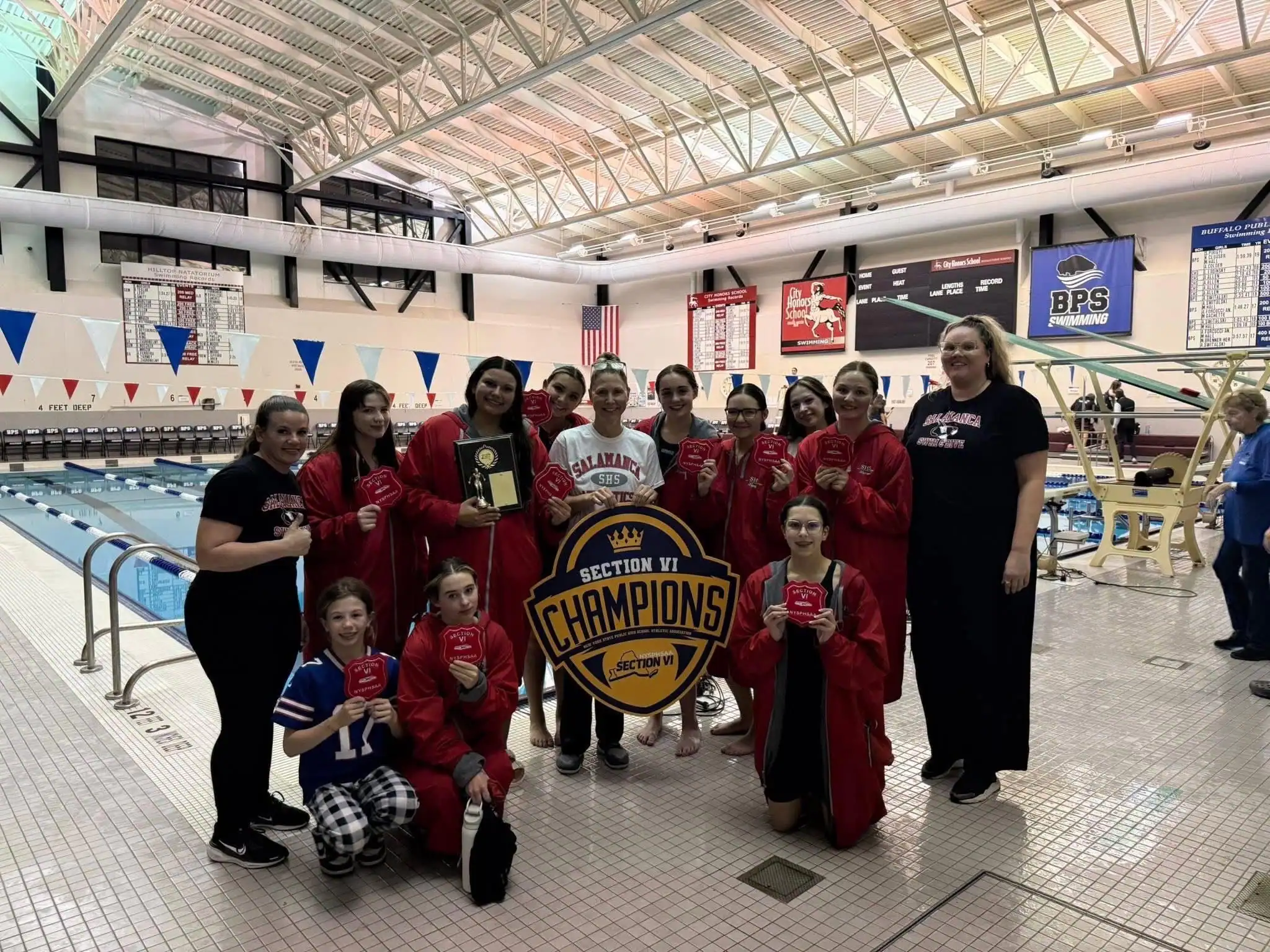 The Salamanca swimming and diving team pose with their patches after finishing second in Section VI Class C. | Photo submitted by Salamanca Warrior Athletics