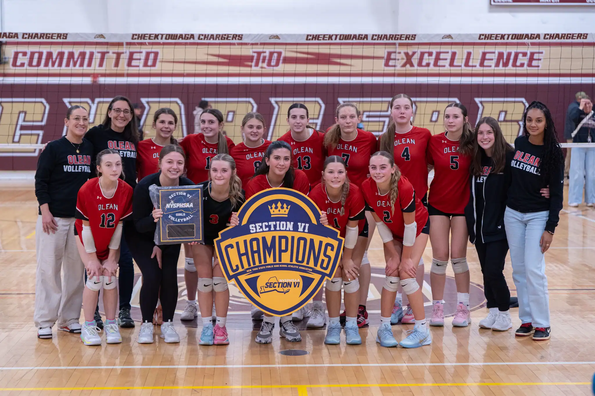 The Olean volleyball team poses as Section VI Champions after defeating Roy-Hart in the Class B Crossover game. The win over the Rams came as Olean's third sweep in four games. | Photo by Hunter O. Lyle