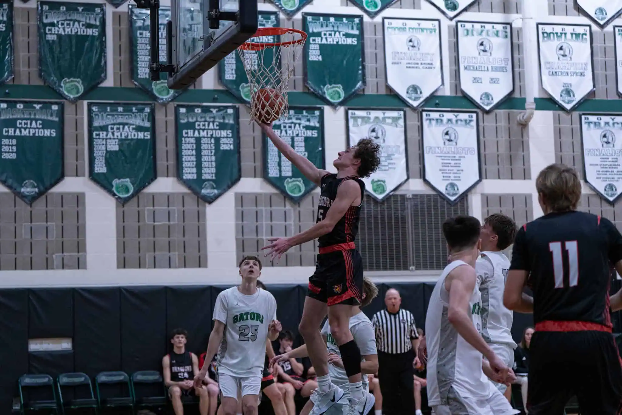 Tyler Simmons reaches out towards the rim during Bradford's win over Allegany-Limestone on Sunday. Simmons ended with a team-high 21 points. | Photo by Hunter O. Lyle