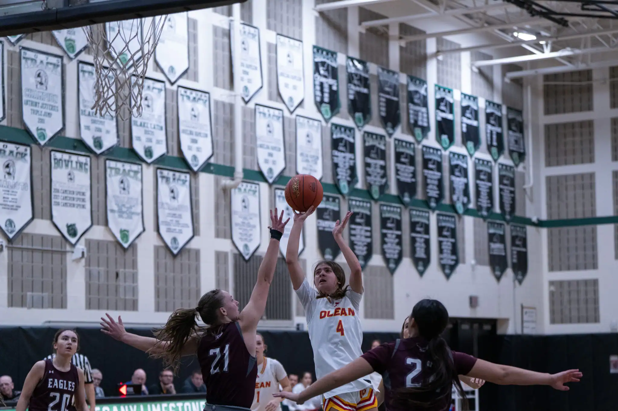 Alaina Hirliman drives through the lane during Olean's in the second day of the Joe DeCerbo Holiday Showcase. | Photo by Hunter O. Lyle