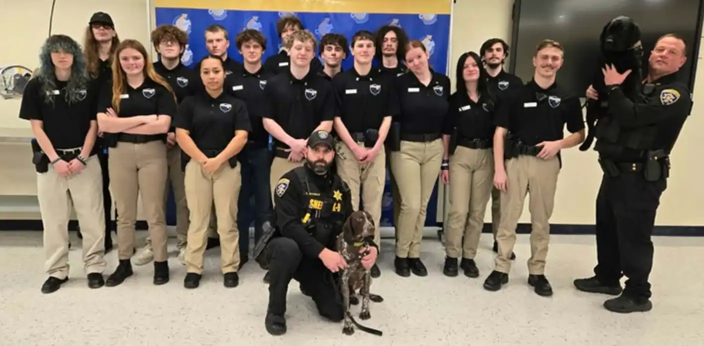 (Sheriff's Office Photo) Cattaraugus County Sheriff's Deputies Pence and Worner brought K9s Nitro and DJ when they spoke recently with Ellicottville BOCES criminal justice students.