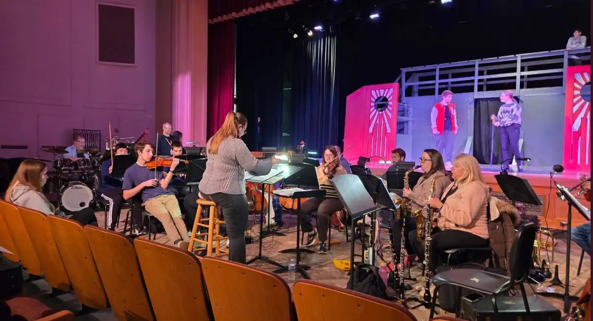 (Olean Music Boosters) Members of the Olean High School Band and performers in this weekend's performance of 'Big Fish' in the Olean High School auditorium practice earlier this week.
