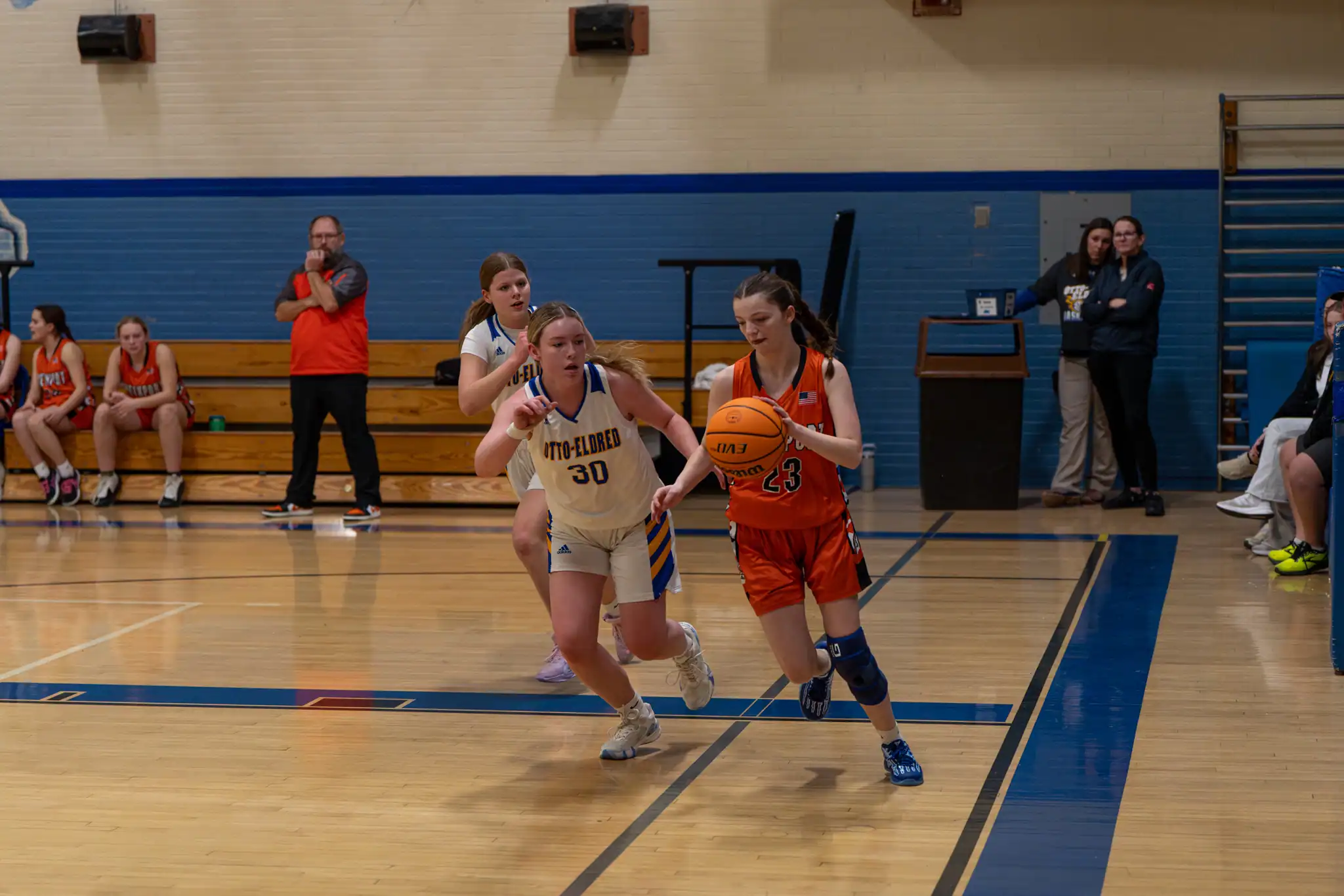 Smethport's Peyton Neff struggles to fend off two Lady Terror defenders during Otto-Eldred's blowout win over the Lady Hubbers on Tuesday. | Photo by Hunter O. Lyle
