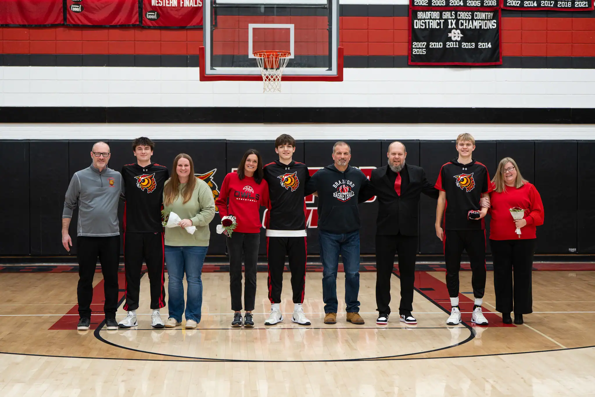 Ahead of their rematch with St. Marys, the Bradford boy's basketball team honored their three seniors. Pictured here with their family members is Landon Lohrman (left to right), Danny Marasco and Marcus Terwilliger. | Photo by Hunter O. Lyle