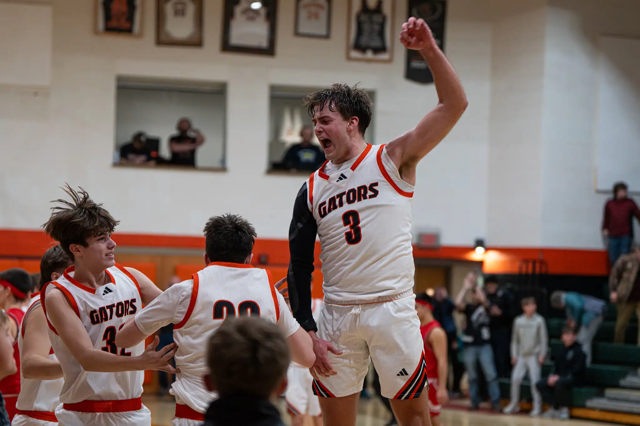 Jarrod Funk celebrates with his teammates after pulling off a last-minute comeback over Cameron County. | Photo by Hunter O. Lyle