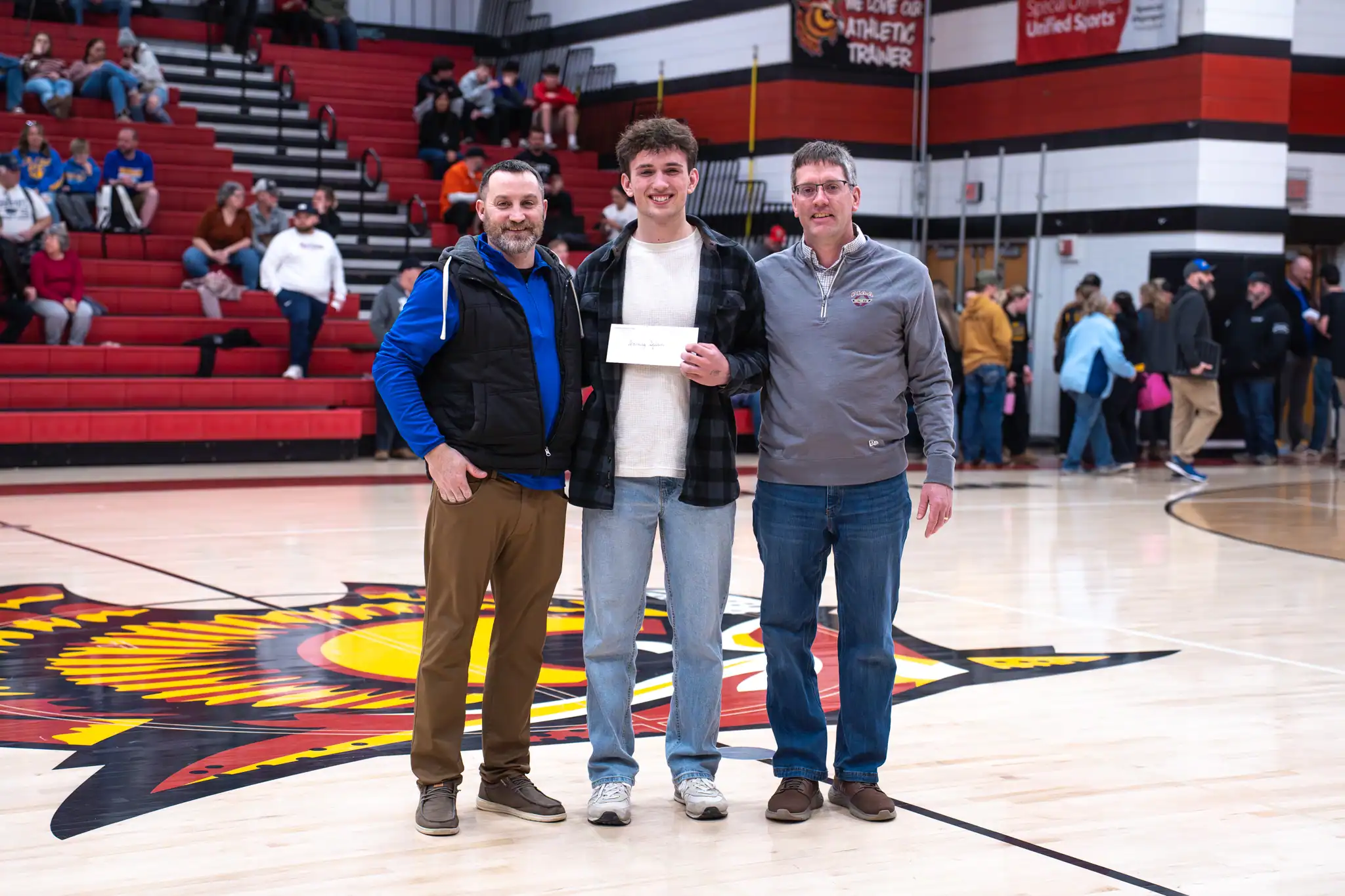 This past weekend, Manning Splain was awarded the annual North Tier League scholarship. Charlotte Austin-Keech was selected as the female recipient, but was not able to attend Saturday's NTL Tournament championship. | Photo by Taylor Komidar