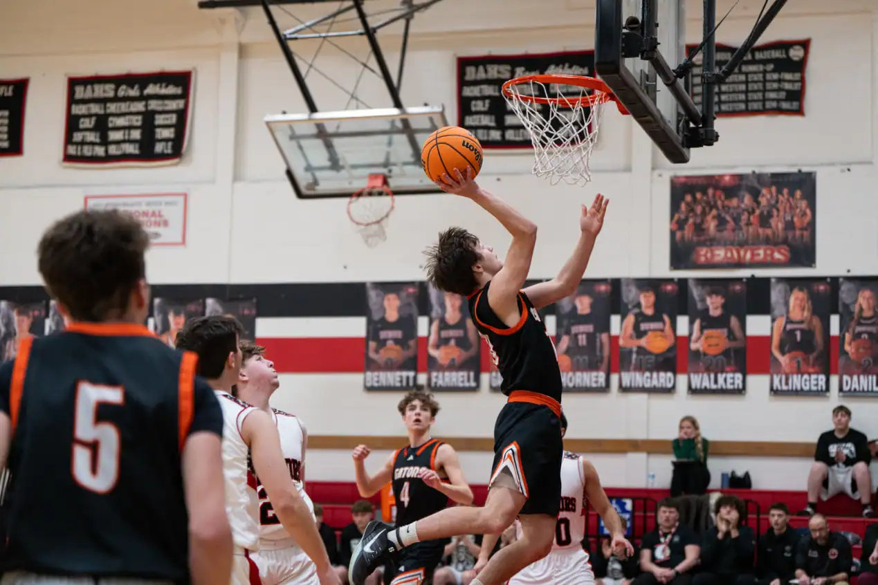 Port Allegany's Nick Wilfong scores an acrobatic layup during the Gators' hot start in their win against Moniteau. | Photo by Hunter O. Lyle