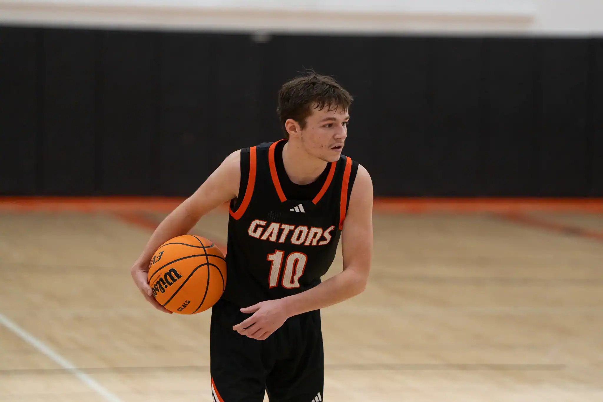 FILE -- Port Allegany's Nick Wilfong sizes up Smethport's defense during their regular season meeting in January. Wilfong was one of three Gators to be selected as a Big 30 All-Star. | File photo by Hunter O. Lyle