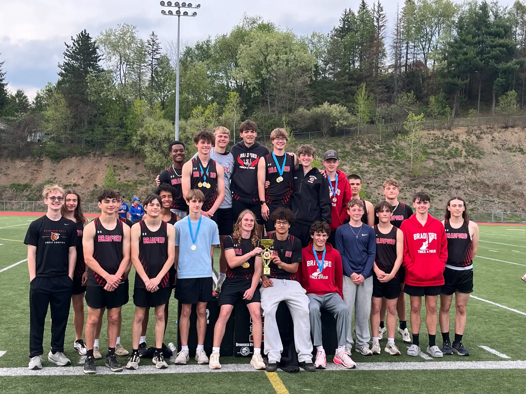 The Bradford boy's track and field team pose after winning the District 9 Championship meet on Tuesday. | Photo by Hunter O. Lyle